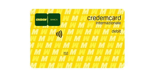 Carta di debito credemcard Internazionale di colore giallo e una grafica sequenziale con M maiuscole e M maiuscole rovesciate, logo della banca e icona contactless. “Credemcard internazionale debit”