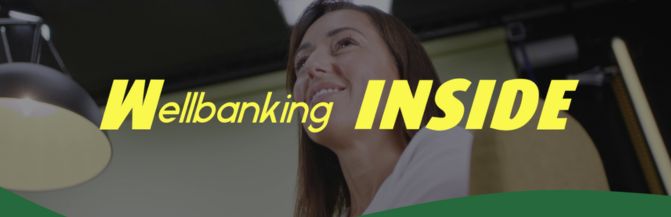 “Wellbanking INSIDE” sullo sfondo una donna sorridente in ufficio